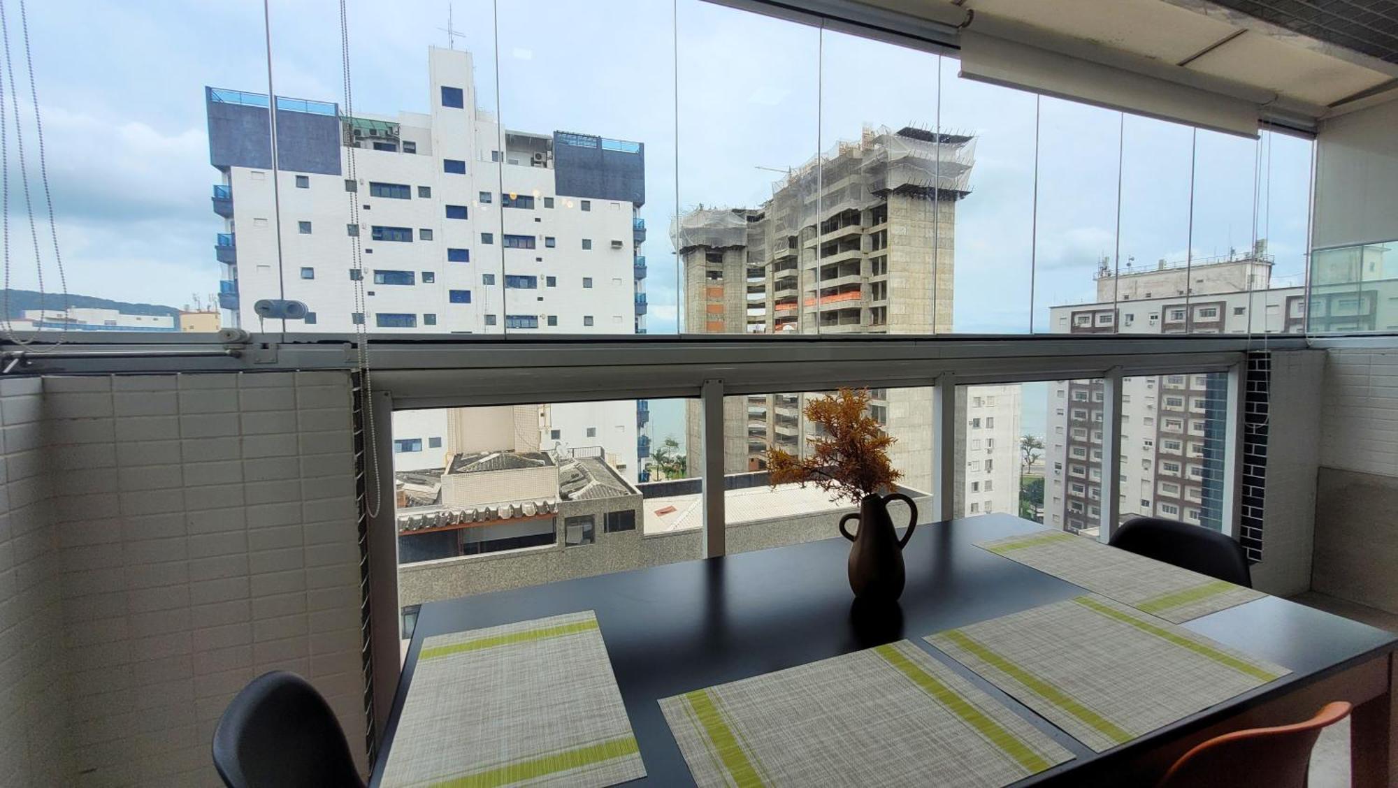 Booksantos Latitude 133 - Ponta Da Praia Vista Mar Bagian luar foto