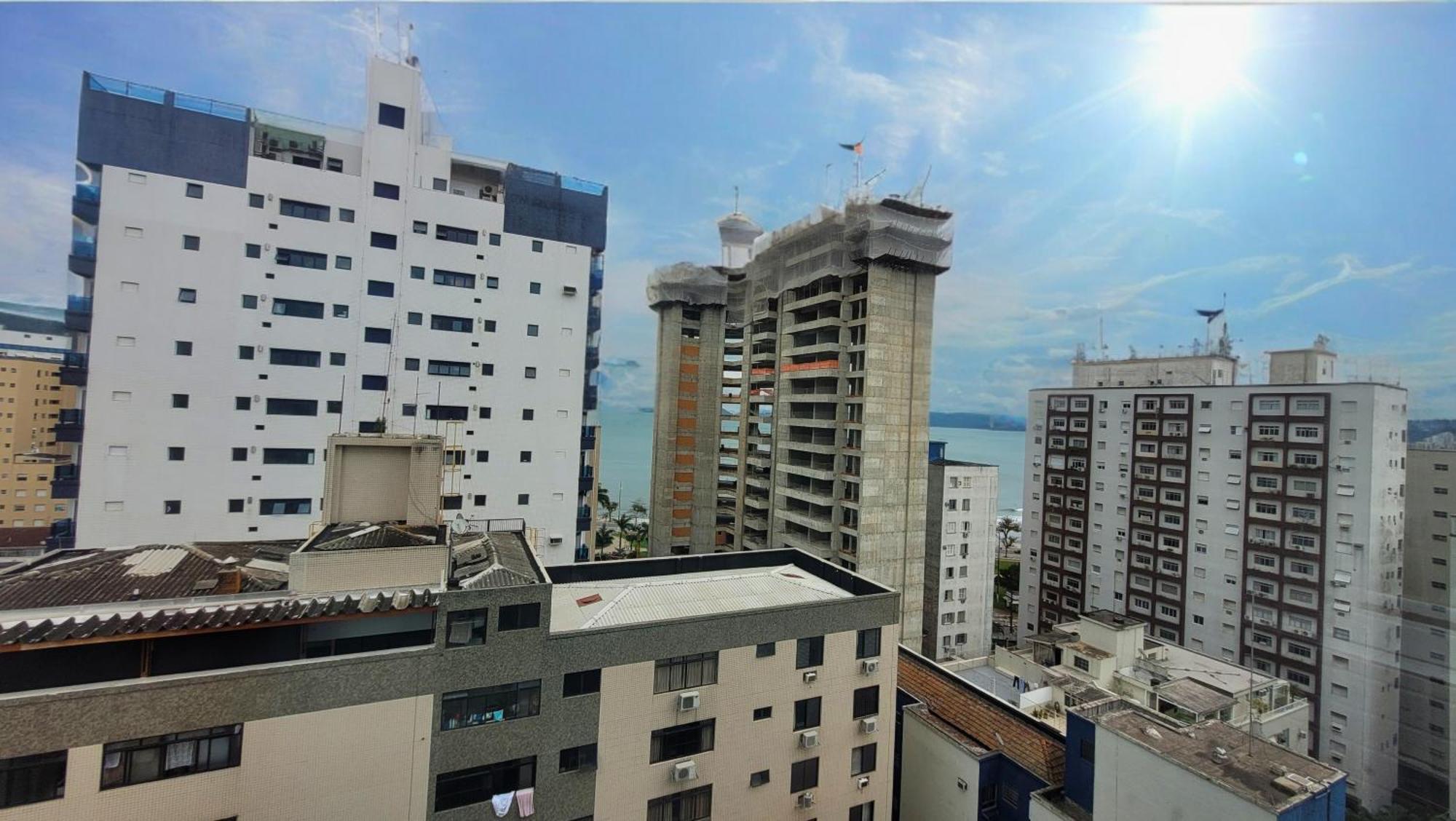 Booksantos Latitude 133 - Ponta Da Praia Vista Mar Bagian luar foto